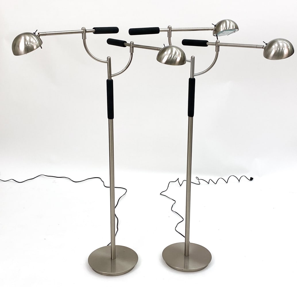 PAIR OF KOVACS W HOLTKOTTER HALOGEN FLOOR LAMPS: Pair of Kovacs floor lamps with Holtkotter Halogen reflector. Features a slender, nickel-plated column, the light source is housed within a cylinder made of highly heat-resistant borosilicate glass. M