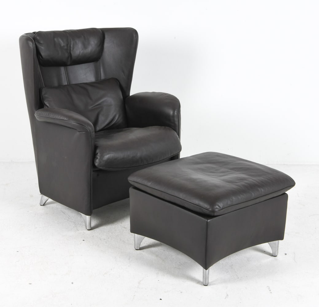 DE SEDE DS-23 LEATHER LOUNGE CHAIR W/ OTTOMAN: Designed by Franz Josef Schulte. Branded to fabric lining under seat and tagged to side of chair. Switzerland, circa 1980s. Dimensions: Chair H 39.25" x W 32" x D 33" x Sh 18". Ottoman H 18" x W 24" x