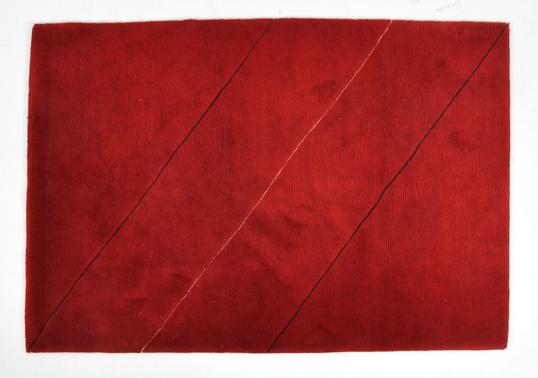 DANISH 'FEEL GOOD' WOOL RUG: Tagged underneath. Dimensions: L 80" x W 56". Condition: Wear consistent with age and use including fading.