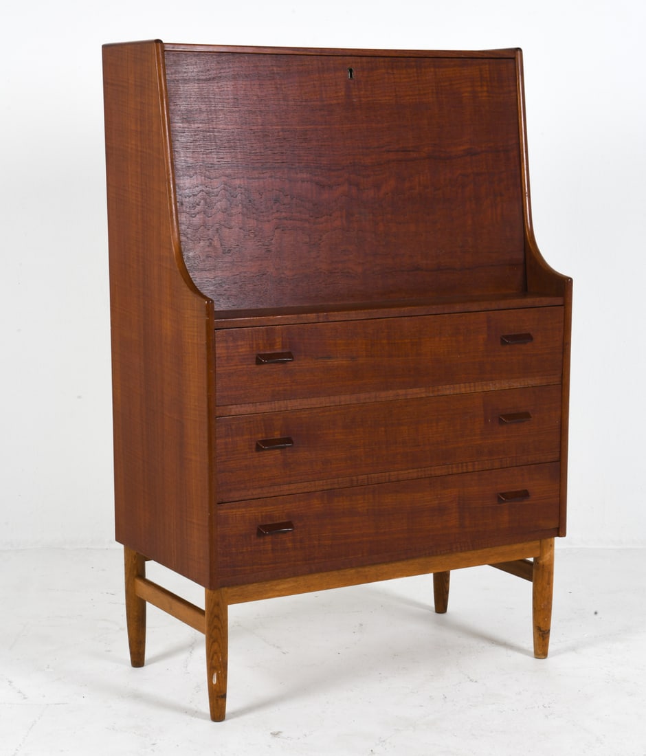 POUL VOLTHER DANISH TEAK SECRETARY CHEST C. 1960S: For Munch Mobler. Key included. Secretary desk with chest of drawers. Front drops down into desk. Apparently unmarked. Denmark, circa 1960s. Dimensions: H 47" x W 31" x D 16.5". Condition: Wear consis