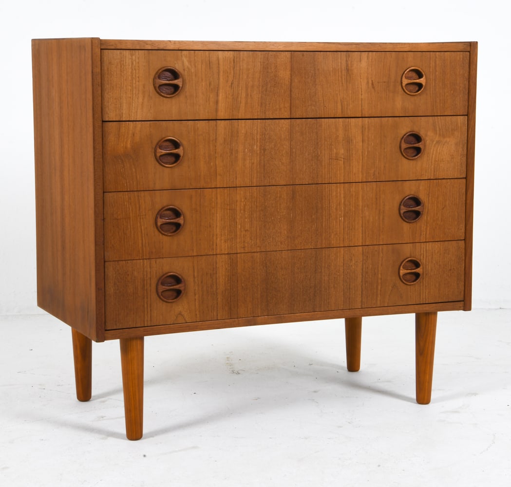 ARNE WAHL IVERSEN STYLE TEAK CHEST OF DRAWERS: Chest of drawers with molded inset drawer pulls. Denmark, circa 1960s. Dimensions: H 29.25" x W 31.5" x D 16". Condition: Wear consistent with age and use including rubs and scratches, minor sticking
