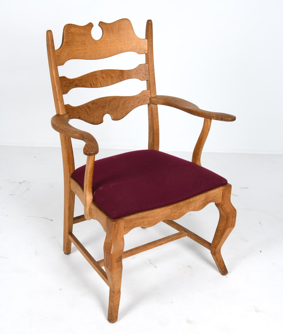 HENNING KJAERNULF "RAZORBLADE" OAK ARMCHAIR 1970S: Oak frame with Razorblade design to seat back. Apparently unmarked. Denmark, circa 1970s. Dimensions: H 39" x W 26.5" x D 18.5" x SH 18". Condition: Wear consistent with age and use, including minor s