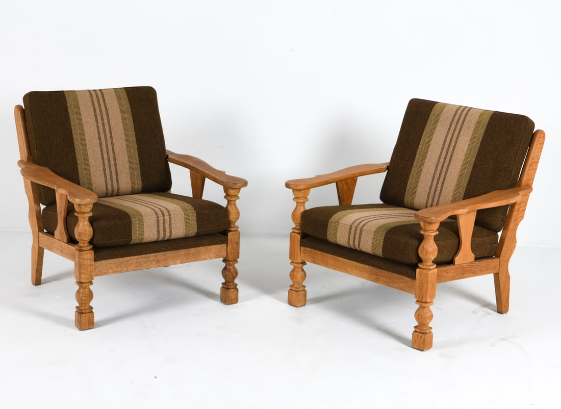 ATTR. HENNING KJAERNULF OAK LOUNGE CHAIRS: Oak frames with striped wool upholstery. Denmark, circa 1970s. Dimensions: H 31.5" x W 29.75" x D 32.5" x Sh 16.25". Condition: Wear consistent with age and use. EN160