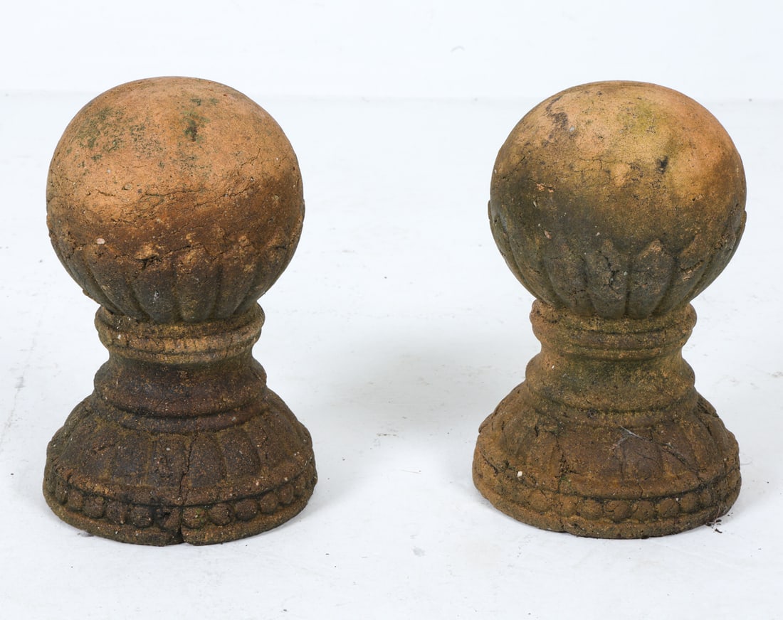 PAIR OF TERRACOTTA OUTDOOR GARDEN FINIALS: Dimensions: H 9.5" x Dia. 6.5" Condition: Wear consistent with age and outdoor exposure.