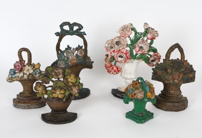 VINTAGE CAST-IRON FLOWER BASKET DOORSTOP GROUPING