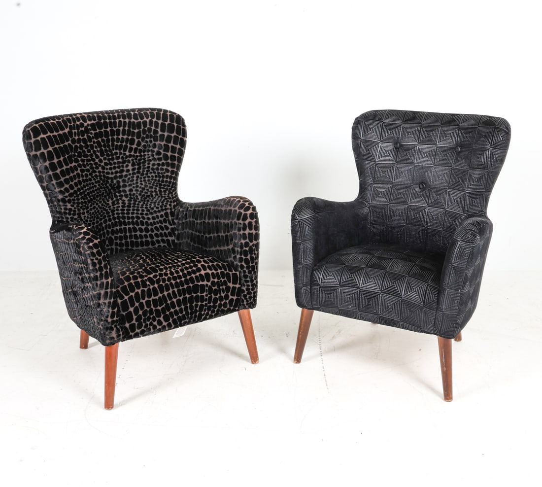 PAIR OF DESIGNERS GUILD LOUNGE CHAIRS: Each chair with a different texture fabric. Black fabric upholstery in varying patterns. One chair labeled lower rear left. Dimensions: Both H 38" x W 28" x D 26" S.H. 17" Condition: Wear consistent w