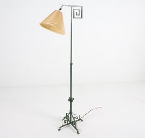 Green painted iron floor lamp. Dimensions: H 63" x W 20" x D 17". Condition: Discoloration to shade.