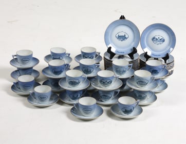 Bing & Grondahl. Large grouping of white & blue dishes with gilded accents. Includes (24) tea cups,