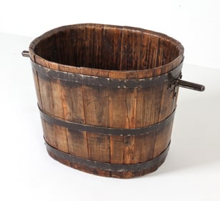Large antique wooden bucket with iron rings and handles. Dimensions: H 19.75" x Dia. 33". Condition: