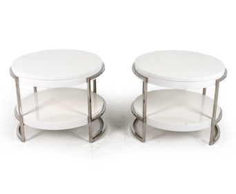 Labeled underneath. Chrome and lacquer finish. Dimensions: H 22" x Dia. 28" Condition: Showing light