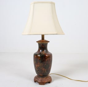 On wood base. Dimensions: H 26.25" x Dia. 6.25". W/ Shade H 28.25". Condition: Chip missing from