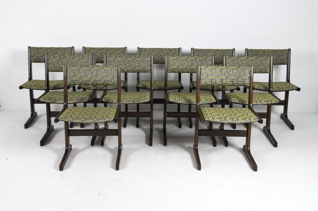 (11) POUL H POULSEN FARSTRUP OAK DINING CHAIRS: Dining chairs with oak frames in dark tone. Patterned fabric upholstery. Tagged under seats. Denmark, circa 1970s. Dimensions: H 31.5" x W 19" x D 16" x SH 18". Condition: Minor scuffs and scratches t