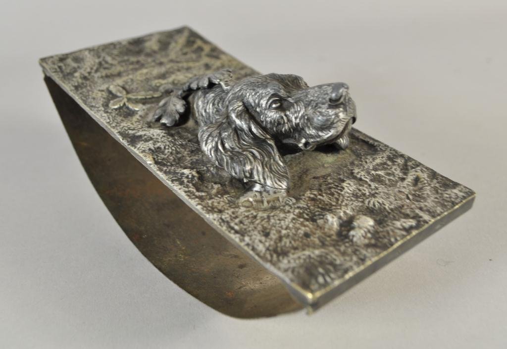 C. 1867 RUSSIAN SILVER FIGURAL DOG INK BLOTTER: Marked on the left side of the dogs ear with the Russian Imperial seal; C.LL/1867; backward N 3 for Ivan Zakharov, Moscow 1856-1896 Dimensions:H 3"in x W 2 7/8" x 6"in Condition: excellent Provenance: