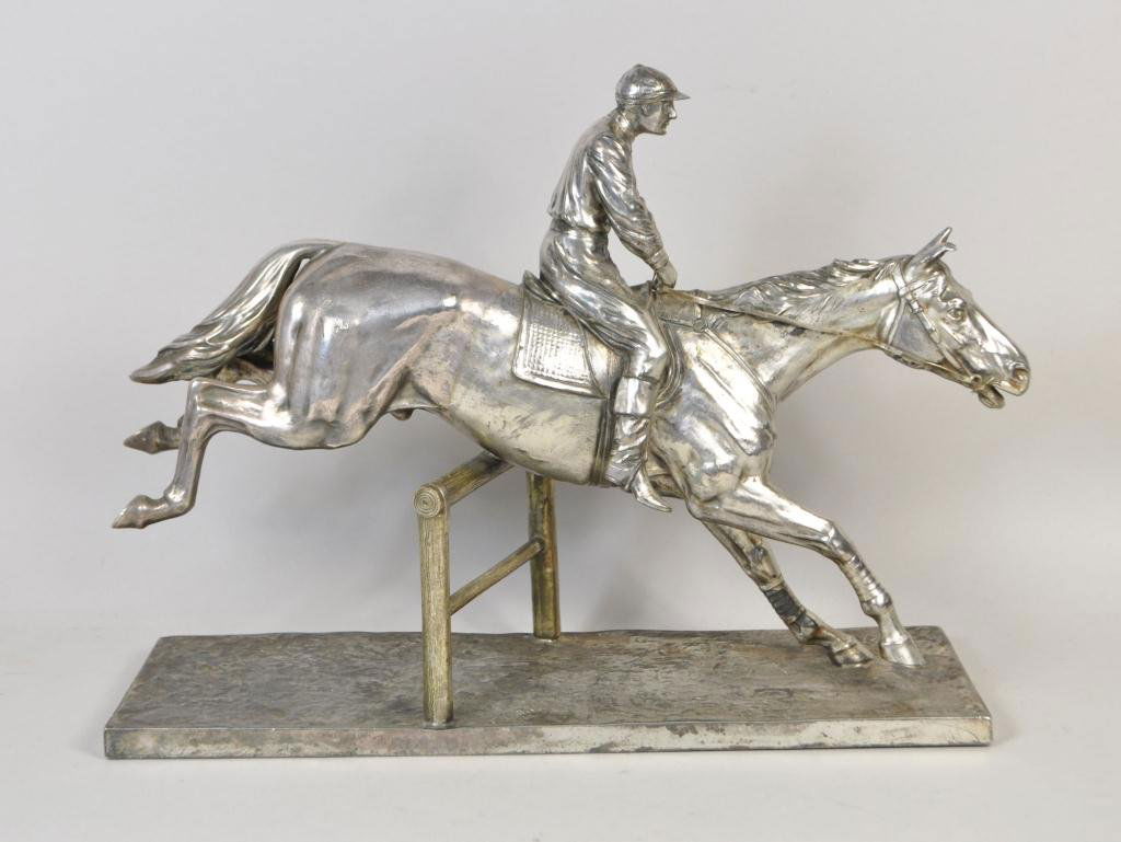 FRITZ DILLER (GERMANY 1875 - 1945): Silverplate sculpture horse & jockey jumping. Hallmarked on the back side from the base B, WMF& OSTRICH, .10, OX. Made by Wurttembergische Meatallwaren Fabrik, Germany. Dimensions:H 10"in x W 4"in x D