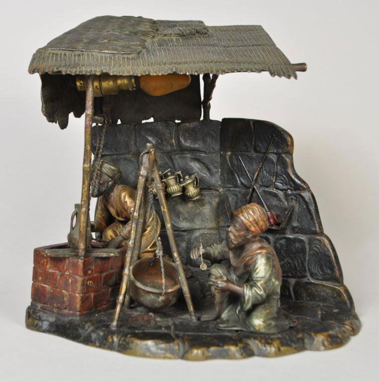 ORIENTALIST VIENNA BRONZE LAMP: Cold-painted bronze two figures collecting water & food vender, ca 1900, stamped on the right side bottom back VII, MADE IN AUSTRIA, BK Dimension: H 8" x W 9 " x D 5 1/2" Condition: scattered loss to
