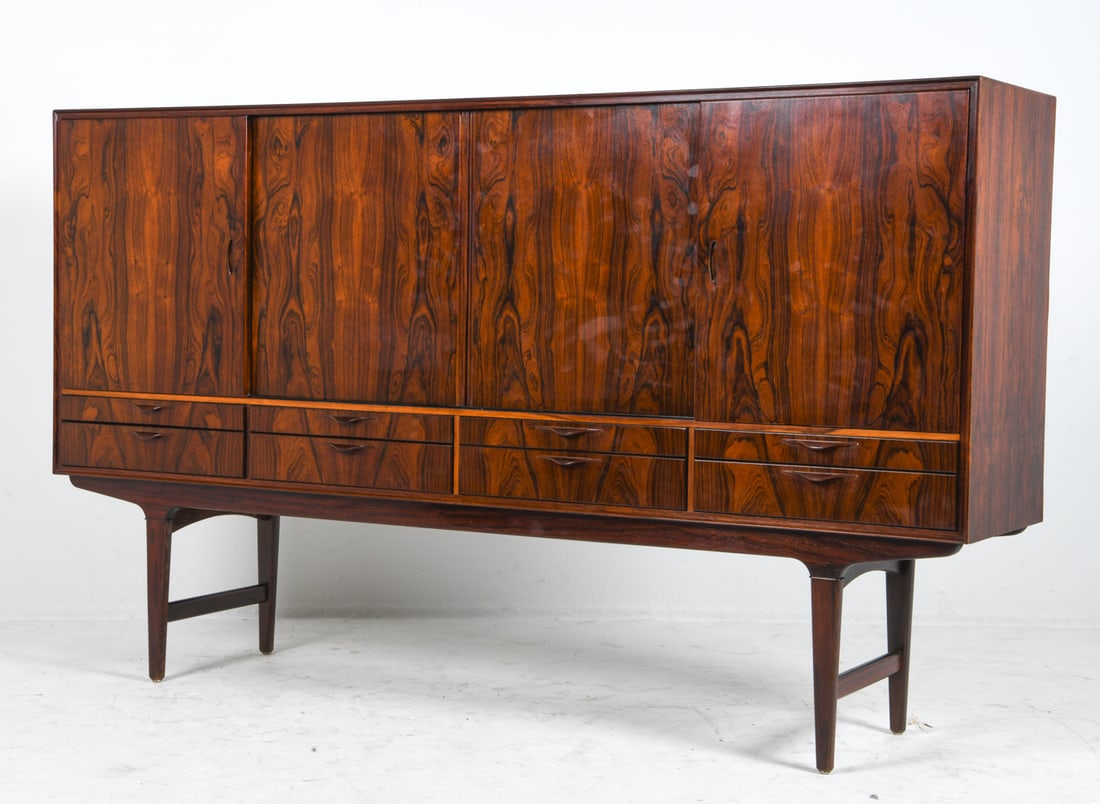 AMAGER BOLIGHUS DANISH ROSEWOOD SIDEBOARD C. 1960S: Tagged on the back. Denmark, circa 1960s. Dimensions: H 46.5" x W 78.5" x D 16.75" Condition: Wear consistent with age and use, including scratches and dings.