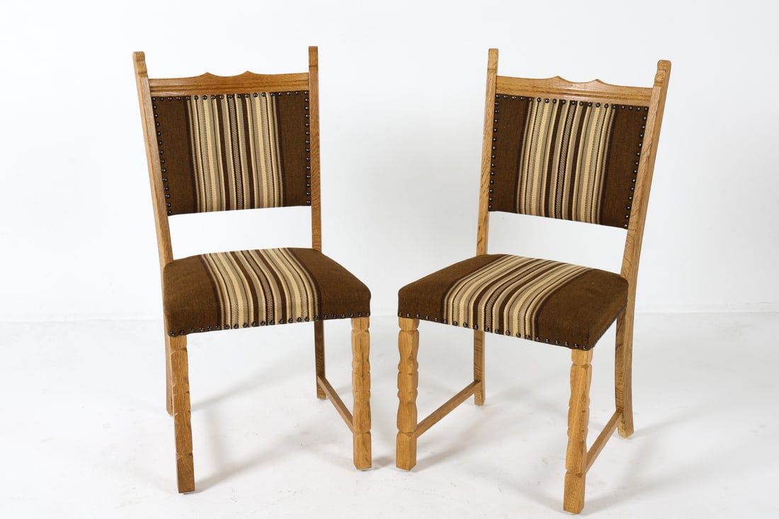 (4) HENNING KJAERNULF STYLE OAK DINING CHAIRS 1970: Oak frames with brown striped wool upholstery. Brass tacks accents. Denmark, circa 1970s. Dimensions: H 36" x W 17.5" x D 16.5" x SH 17.25". Condition: Minor scuffs and dings to wood. Wear consistent