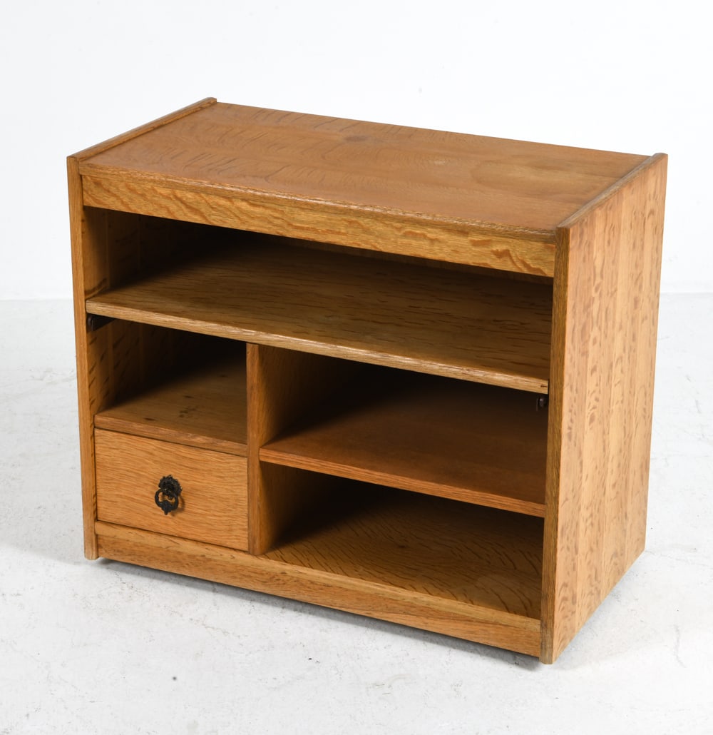 DANISH OAK MEDIA CABINET C. 1970S: Media chest with (1) drawer. Pull out drawer. Lighted shelf. Denmark, circa 1970s. Dimensions: H 26" x W 30.5" x D 16". Condition: Wiring untested, European plug. Wear consistent with age and use.