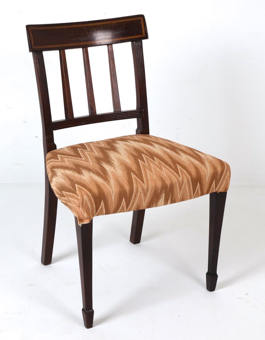 ANTQUE MAHOGANY DINING SIDE CHAIR: Mahogany banister back side chair with patterned fabric upholstered seat. Dimensions: H 31" x W 21" x D 16" x SH 17.25". Condition: Back is loose. Scuffs, scratches, dings. Wear consistent with age an