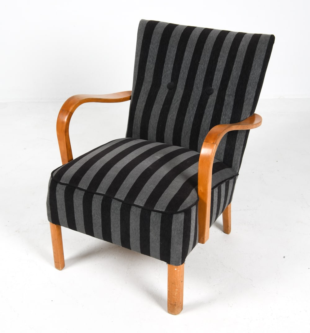 ALFRED CHRISTIANSEN STYLE WINGBACK CHAIR: Wingback lounge chair with birch bentwood arms. Sweden, circa 1960s. Dimensions: H 31" x W 25.5" x D 33" x Sh 16.5". Condition: Wear consistent with age and use, including dings and rubs to armrest an
