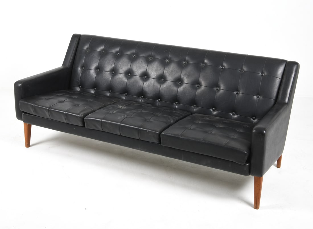 ENGEN MOBLER SWEDISH TEAK & FAUX LEATHER SOFA: Teak frame with faux leather upholstery. Marked under the seating area. Sweden, circa 1960s. Dimensions: H 30" x W 69" x D 27" Condition: Wear consistent with age and use. Fabric loose lower right sid