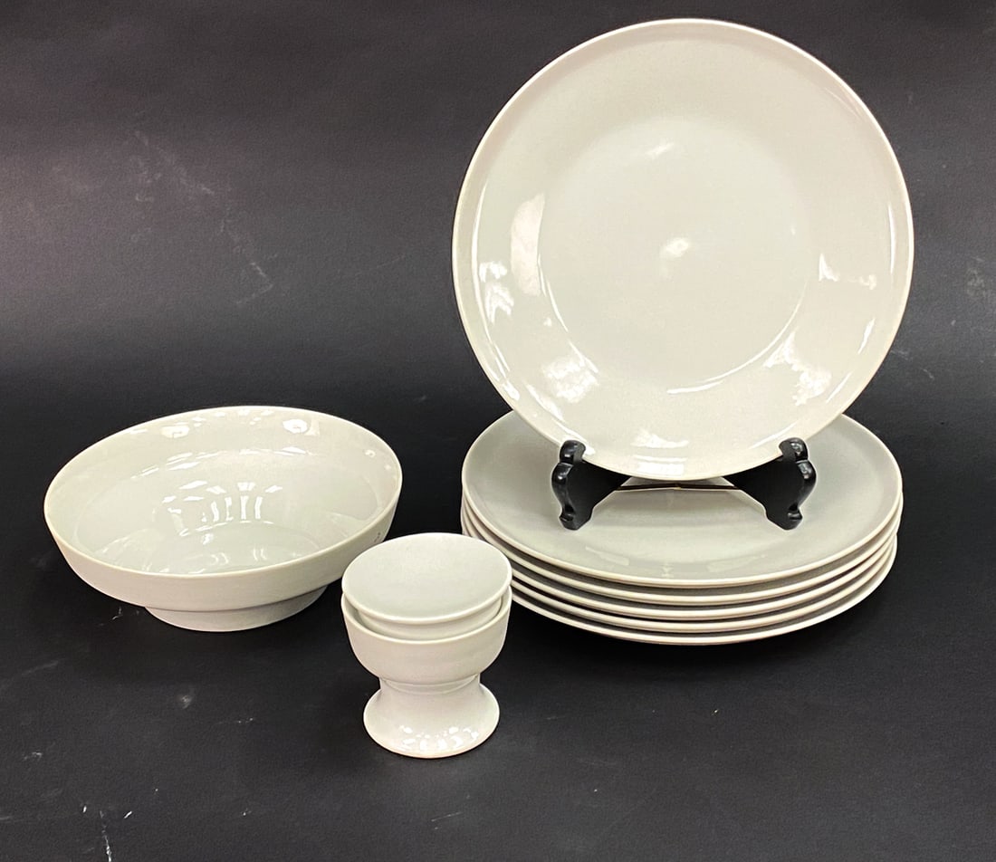 PAUL MCCOBB "CONTEMPRI" PORCELAIN GROUPING: (8) Dish set including 6 serving plates, 1 bowl and one sugar pot, by Paul McCobb for Jackson Internationale, from "Contempri" collection. Marked and signed underneath. Dimensions: (Largest) Dia 10.5"