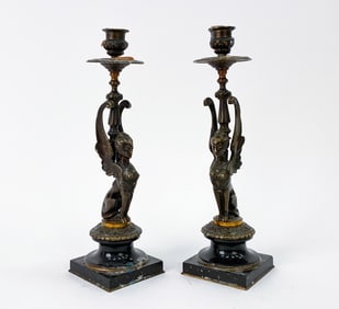 EGYPTIAN REVIVAL BRONZE WINGED SPHINX CANDLESTICKS