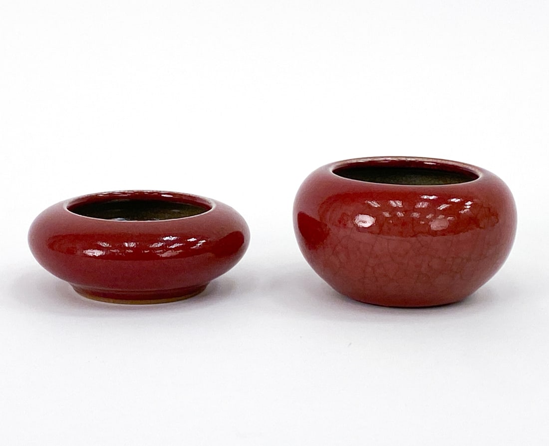 (2) CHINESE PORCELAIN BOWLS: Red crackle-glazed ceramic bowls with a celadon green interior. Dimensions: (Largest) H 2.5" x Dia 4.5" Condition: No issues to note.