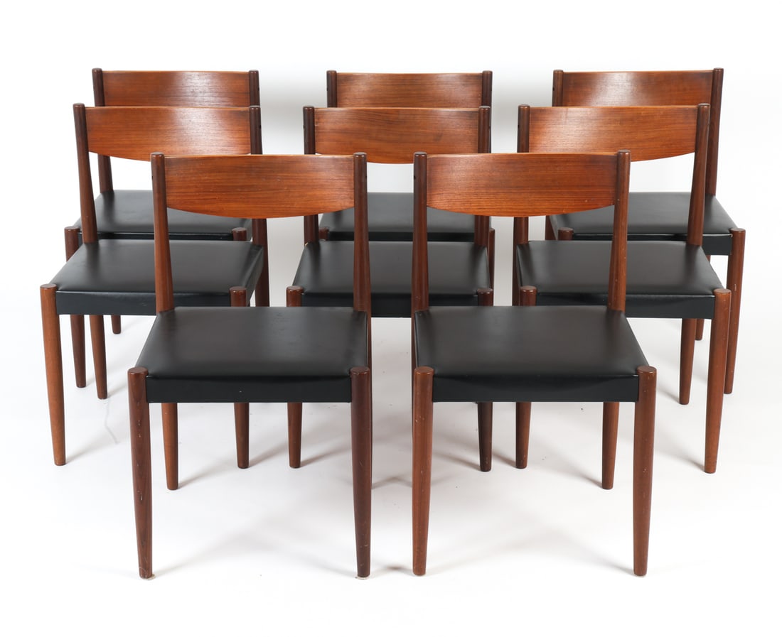 (8) POUL VOLTHER FOR FREM ROJLE DINING CHAIRS: (8) Danish teak and black vinyl dining chairs designed by Poul Volther for Frem Rojle. Features curved and sculpted backrests. Danish furniture control label and stamp on undersides. Dimensions: H 30.