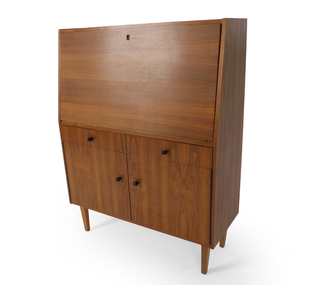 MID-CENTURY DUTCH TEAK SECRETARY DESK CIRCA 1960'S: Dutch teak secretary desk with a drop-down front that serves as a writing surface, with internal compartments. Netherlands, circa 1960's. Dimensions: H 46.5" x W 35.75" x D 11" Condition: Minor cuffs,