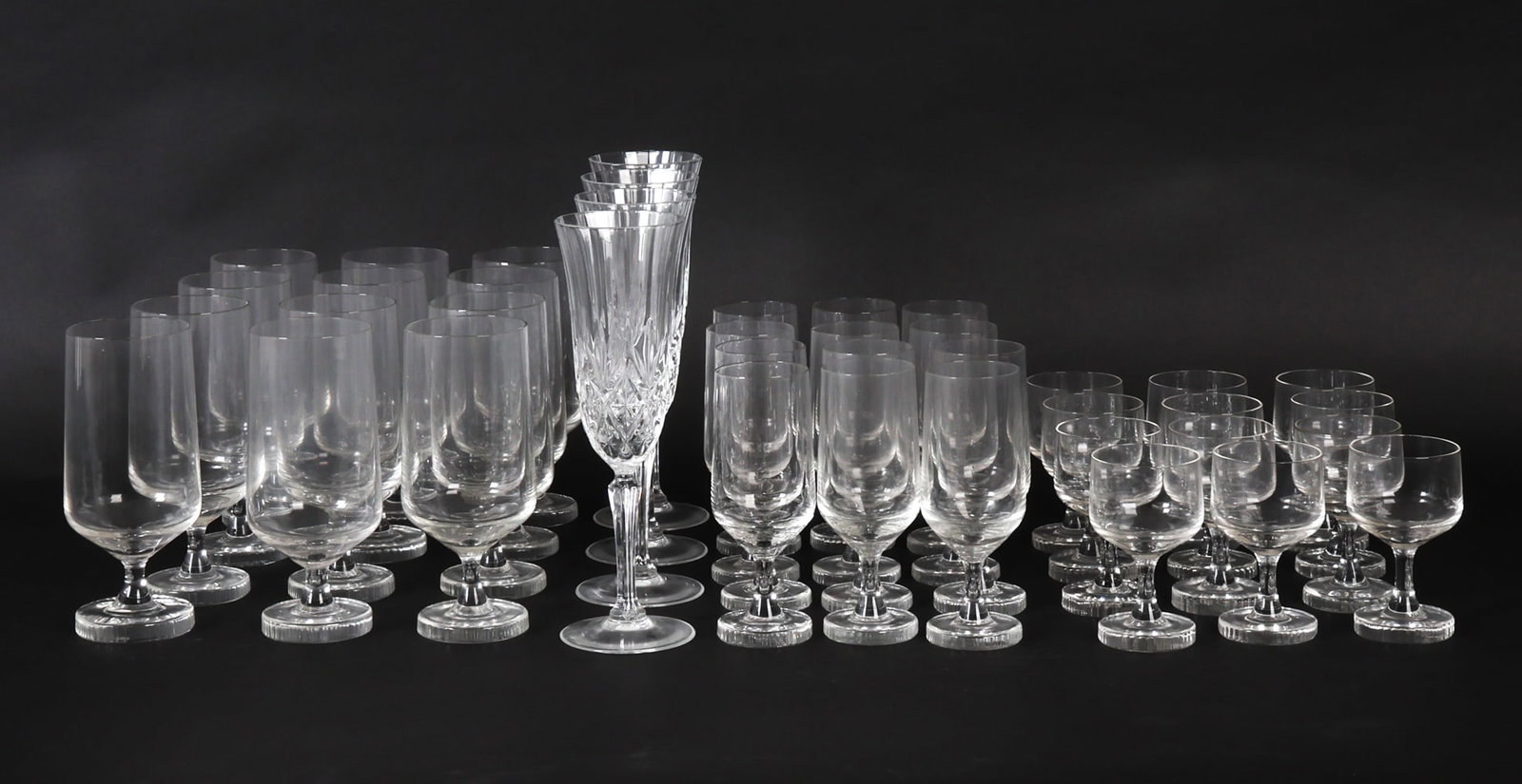 GROUPING OF ROSENTHAL GLASSES INCL. OTHERS: (40) Total glasses, many of the glasses are marked for Rosenthal, (4) of the glasses are in the style of Waterford. Some glasses unmarked and possibly not original. Dimensions: (Tallest) H 8.5" x Dia 