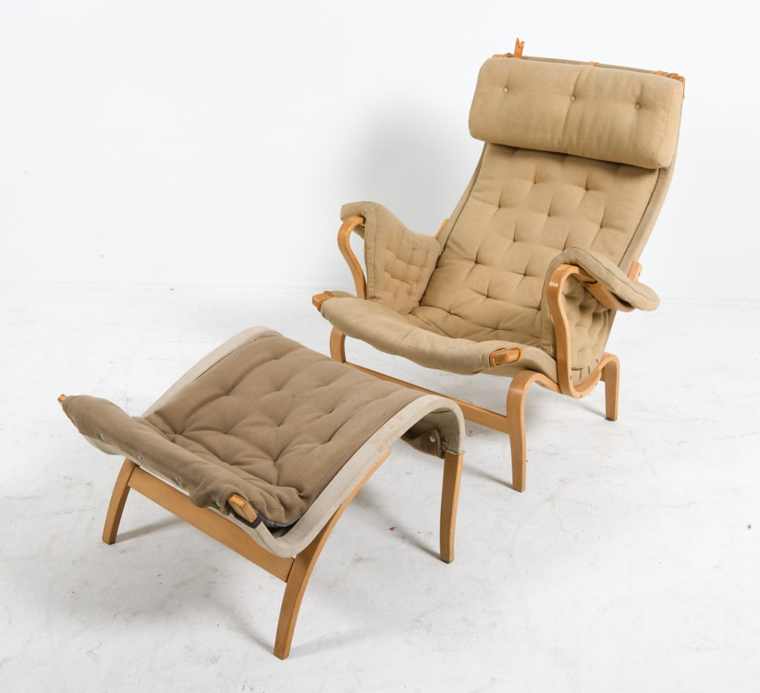 BRUNO MATHSSON "PERNILLA" LOUNGE CHAIR & OTTOMAN: For Dux. "Pernilla" lounge chair together with matching ottoman. Beech frames with fabric upholstery. Signed to stretched bar on frame. Swedish, circa 1970s. Dimensions: Chair H 39" x W 34" x D 31" x