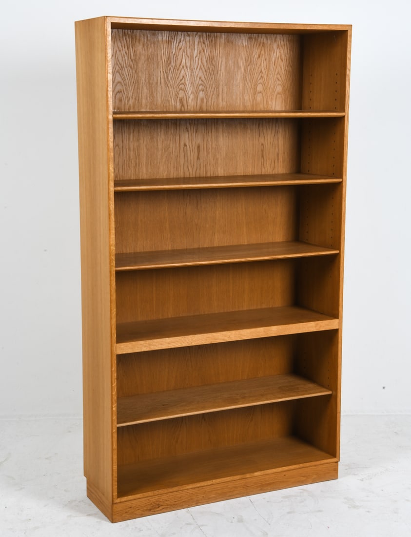BORGE MOGENSEN DANISH OAK BOOKCASE C. 1960S: For Soborg Mobler. Adjustable shelves. Tagged to back. Denmark, circa 1960s. Dimensions: H 71.5" x W 39.25" x D 12.5". Condition: Wear consistent with age and use including dings and rubs. DMW072