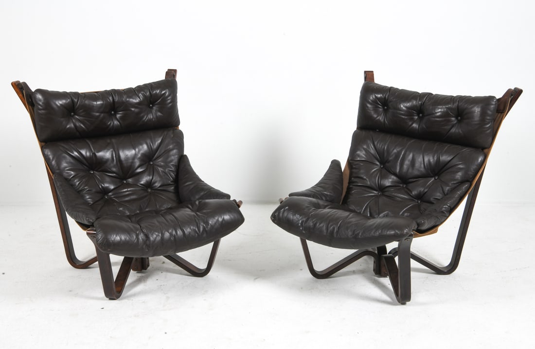 PAIR OF JIM MYRSTAD "VIKING" LEATHER LOUNGE CHAIRS: Pair of lounge chairs for Brunstad Mobelfabrik. Beech bentwood frames and leather cushions. Apparently unmarked. Norway, circa 1970s. Dimensions: H 36.5" x W 30" x D 25" x SH 17". Condition: Few scuff