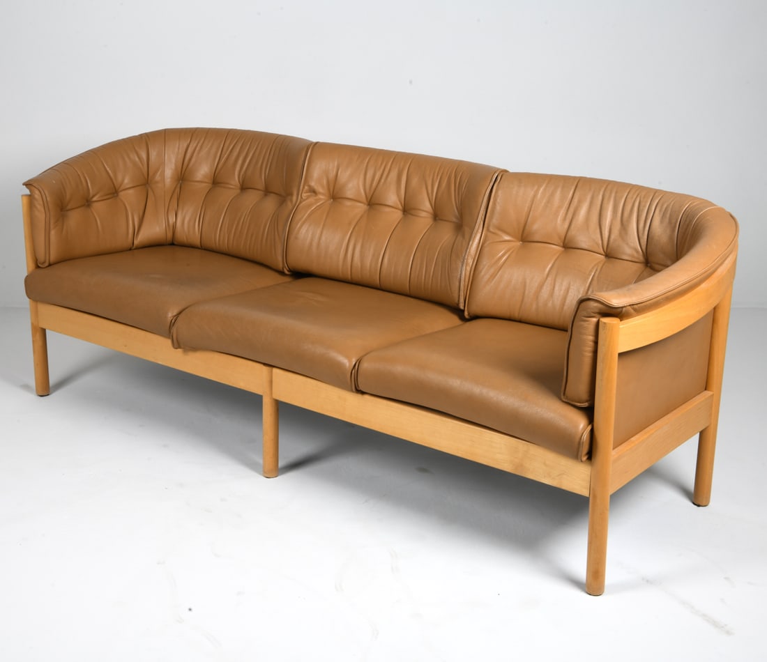 ARNE VODDER "N100" BEECH & LEATHER SOFA C. 1970S: For Nielaus Mobler. Beech frame with tufted tan leather upholstery. Fabric lining under cushions. Apparently without tags. Denmark, circa 1970s. Dimensions: H 30.5" x W 84.5" x D 31" x SH 17.5". Condi