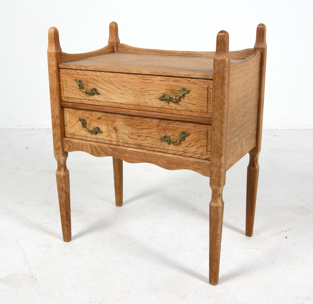 HENNING KJAERNULF OAK SIDE CHEST C. 1960S: Oak side chest or night stand with (2) drawers. Apparently unmarked. Denmark, circa 1960s. Dimensions: H 25.5" x W 20" x D 13". Condition: Faint water spot to top. Wear consistent with age and use. DM