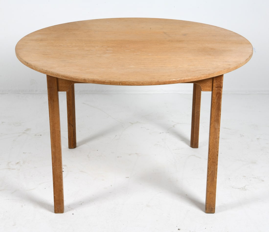 BORGE MOGENSEN DANISH OAK DINING TABLE C. 1960S: For Fredericia Stolefabrik. Oak dining table with round top. Tagged under the top. Denmark, circa 1960s. Dimensions: H 27" x Dia. 43". Condition: Minor scuffs and scratches, wear consistent with age a