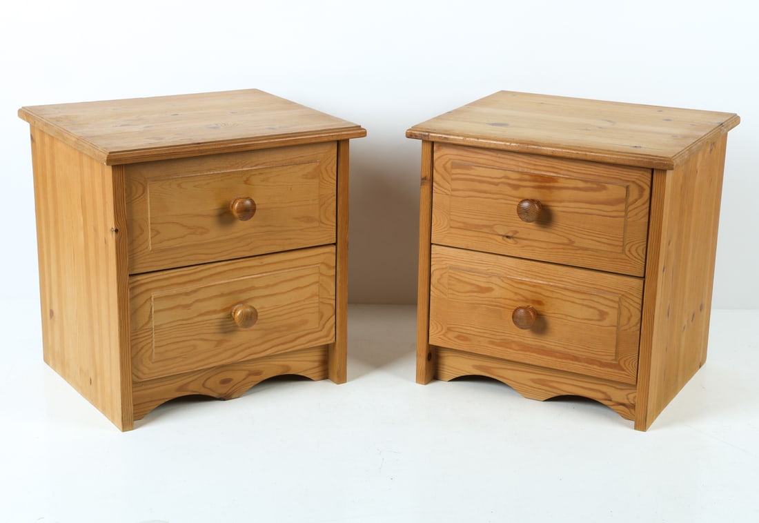 PAIR OF SWEDISH PINE NIGHTSTANDS C. 1970S: Two drawers on the curved base. Sweden, circa 1970s. Dimensions: H 18.25" x W 17.75" x D 15.25". Conditions: Wear consistent with age and use, including minor dings and rubs. DMW140