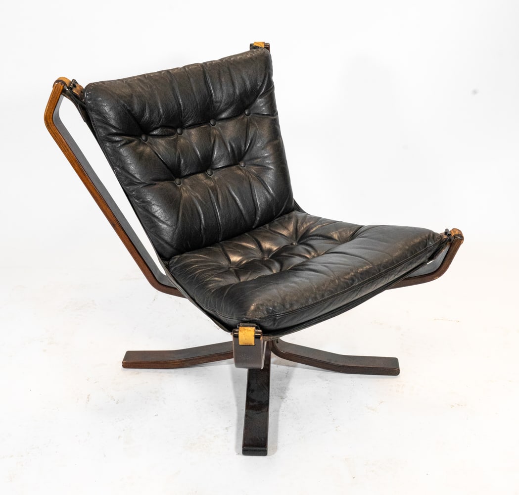 SIGURD RESSEL "FALCON" BEECH & LEATHER CHAIR 1970S: For Vatne Mobler. Beech frame with leather cushion. Apparently unmarked. Norway, circa 1970s. Dimensions: H 33" x W 29" x D 26" x SH 16.5". Condition: Scuffs and scratches to wood and leather, wear co