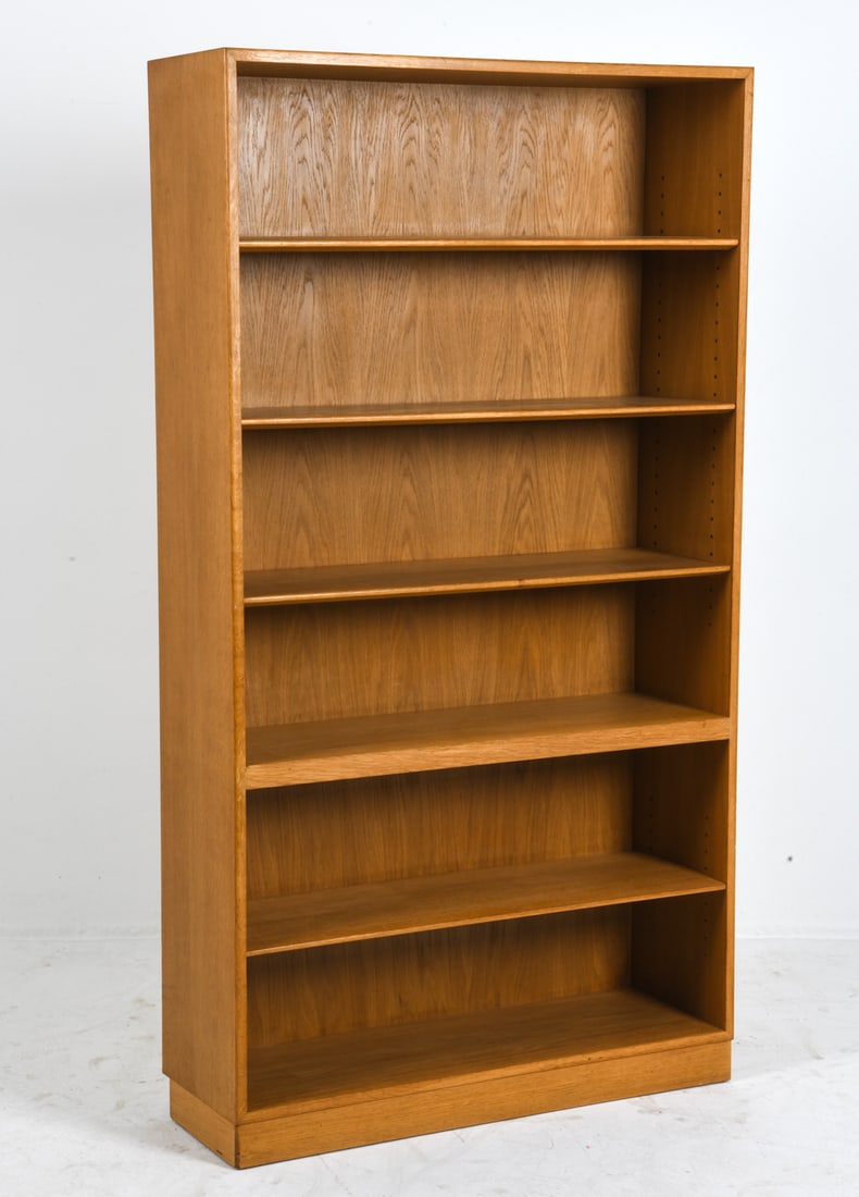 BORGE MOGENSEN DANISH OAK BOOKCASE C. 1960S: For Soborg Mobler. Adjustable shelves. Tagged on back. Denmark, circa 1960s. Dimensions: H 71.25" x W 39.5" x D 12.25" Condition: Wear consistent with age and use including minor rubs and dings, missi