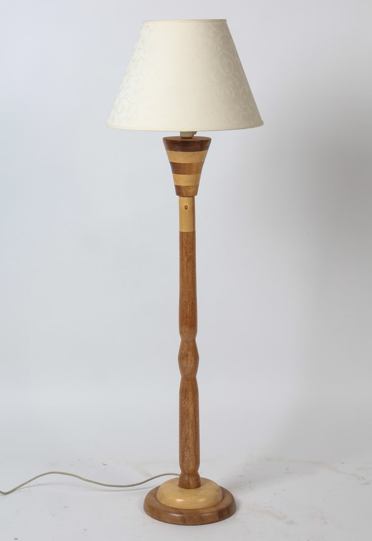 SCANDINAVIAN BEECH & TEAK FLOOR LAMP C. 1970S: Floor lamp with beech and teak wood in alternating segments. Scandinavian, circa 1970s. Dimensions: H 50" x Dia. 15.5". Condition: Wiring untested, European plug. Wear consistent with age and use. DMW