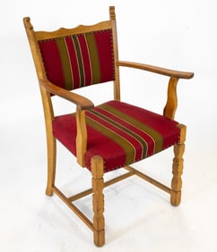 MANNER OF HENNING KJAERNULF DANISH OAK ARMCHAIR