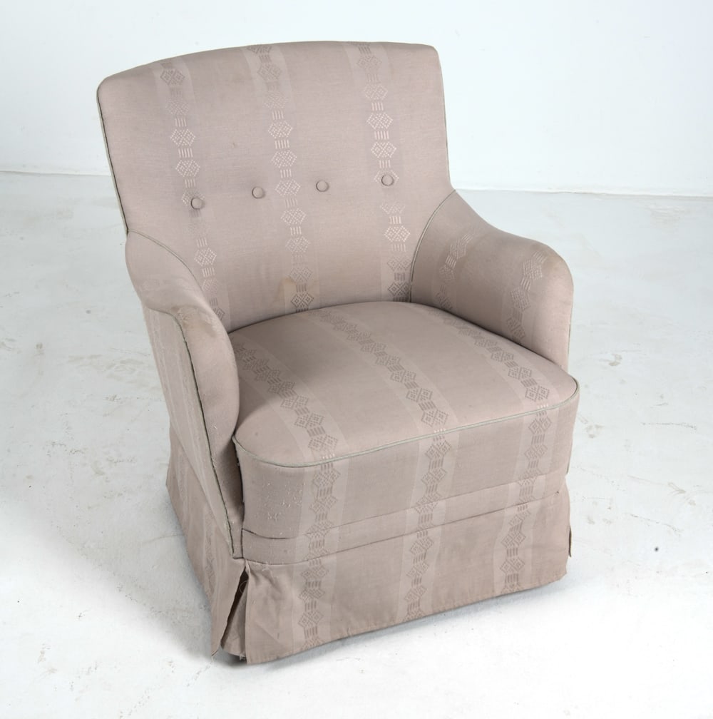 SCANDINAVIAN LOUNGE CHAIR C. 1960S: Lounge chair in grey fabric upholstery. Scandinavian, circa 1960s. Dimensions: H 31" x W 26.5" x D 23". Condition: Few scuffs to legs, wear consistent with age and use. DMW184