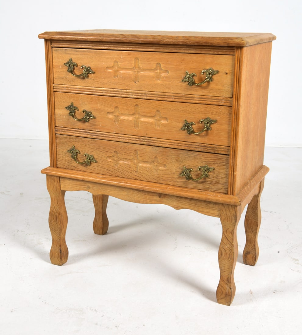 DANISH OAK SIDE CHEST NIGHTSTAND C. 1960S: Oak side chest with brass pulls. Denmark, circa 1960s. Dimensions: H 27.25" x W 23" x D 13". Condition: Slight sun fading to top. Wear consistent with age and use. DMW199
