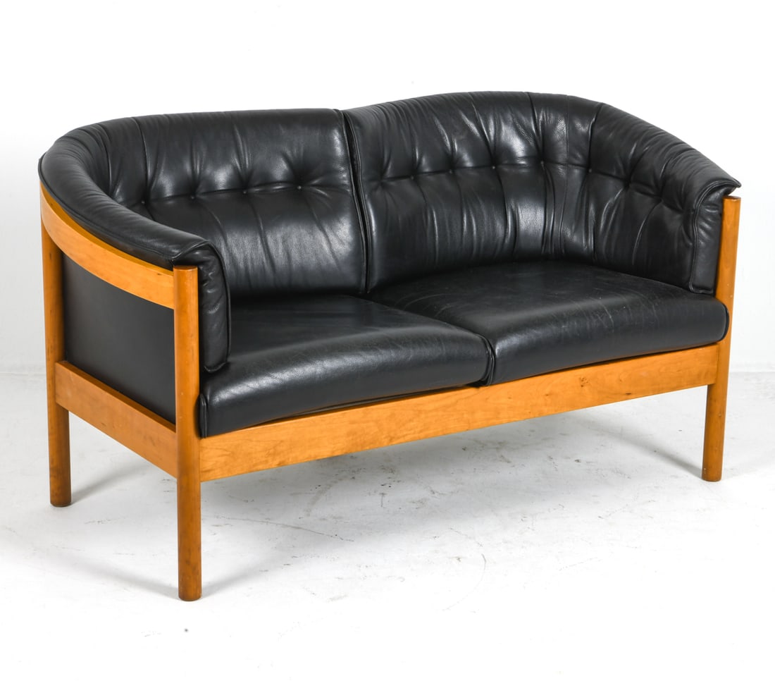 ARNE VODDER DANISH BEECH & LEATHER LOVESEAT 1960S: Model N100 for Nielaus Mobler. Beech frame with black leather upholstery. Apparently unmarked. Denmark, circa 1960s. Dimensions: H 31" x W 60" x D 30" x Sh 17". Conditions: Wear consistent with age an