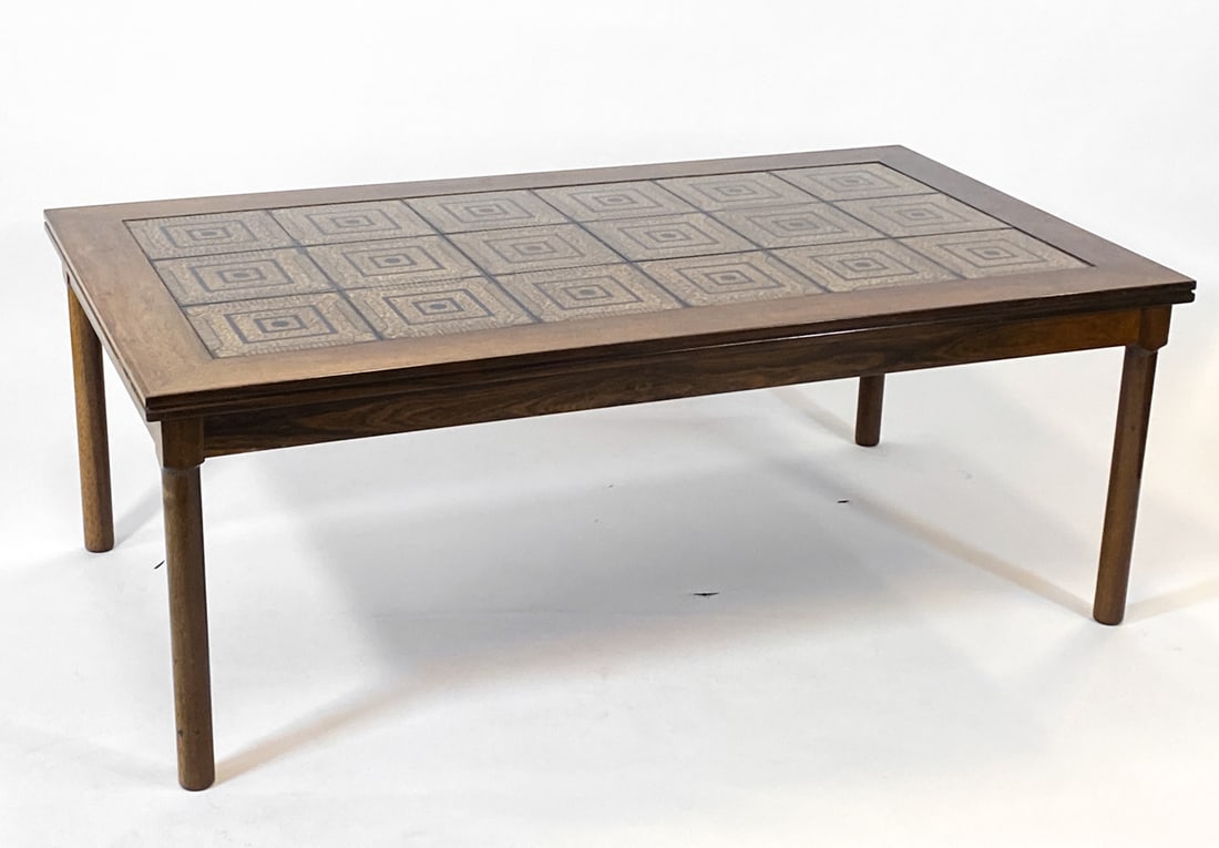 KVALITET OAK & CERAMIC TILE COFFEE TABLE C. 1960S: From Kvalitet Form Funktion, tagged underneath. Oak coffee table with ceramic tiles inlaid to top. Denmark, circa 1960s. Dimensions: H 20.5" x W 55.25" x D 31.25". Conditions: Wear consistent with age