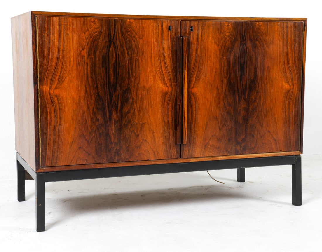 BERNADOTTE & BJORN BAR REFRIGERATOR CABINET 1960S: Key included. Designed by Sigvard Bernadotte and Acton Bjorn for Atlas and Silkeborg Mobelfabrik. Rosewood cabinet with built-in refrigerator. Marked to interior of door. Denmark, circa 1960s. Dimensi