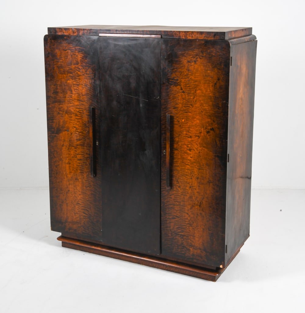 ATTR. UP ZAVODY BURL WALNUT GENTLEMAN'S ARMOIRE: Adjustable shelves/drawers inside. Czech, circa 1940s. Dimensions: H 66.75" x W 55.75" x D 22.75" Conditions: Wear consistent with age and use, including dings and scratches, losses to veneer on door.