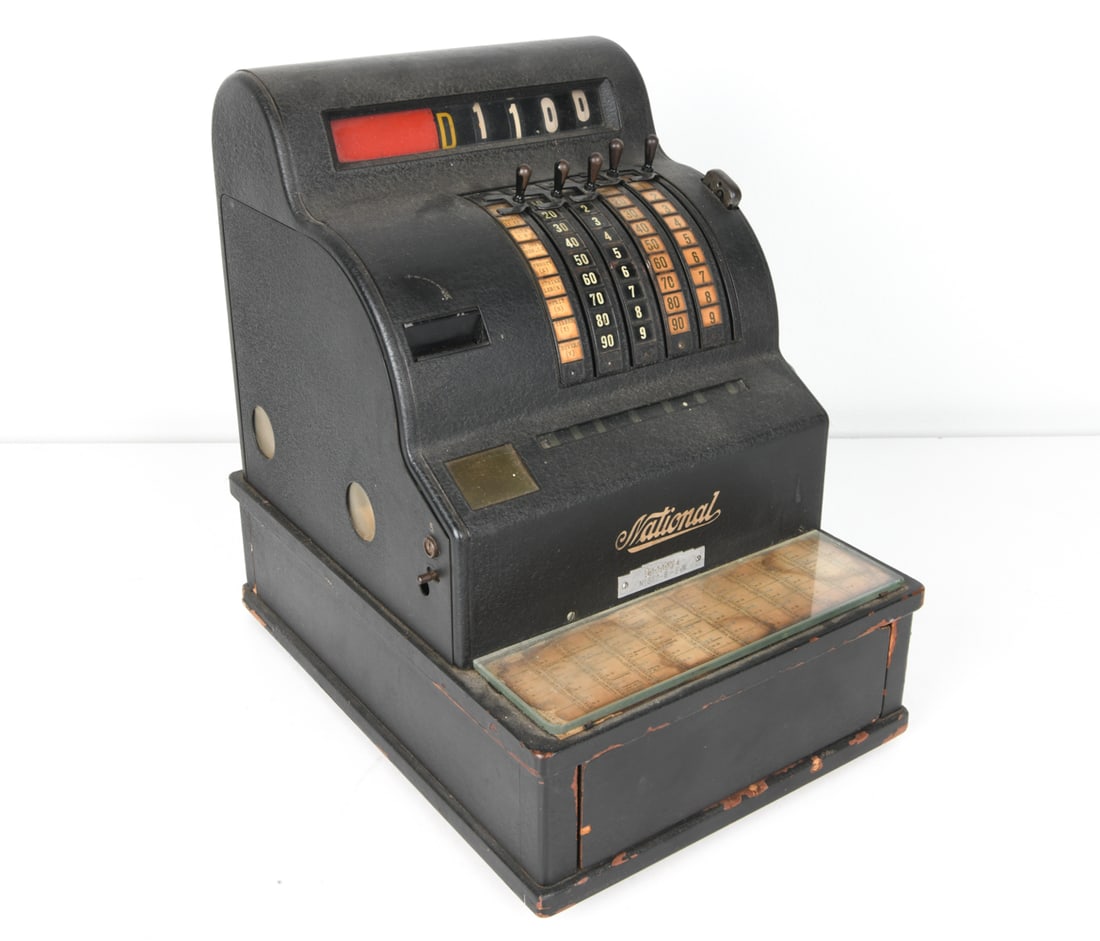 VINTAGE NATIONAL CASH REGISTER C. 1940S: Cast iron case with branding to back. Numbers in Danish currency. Circa 1940s. Dimensions: H 16.5" x W 11.25" x D 16". Condition: Levers turn slightly stiffly. Few flaking spots to painted finish. Wea