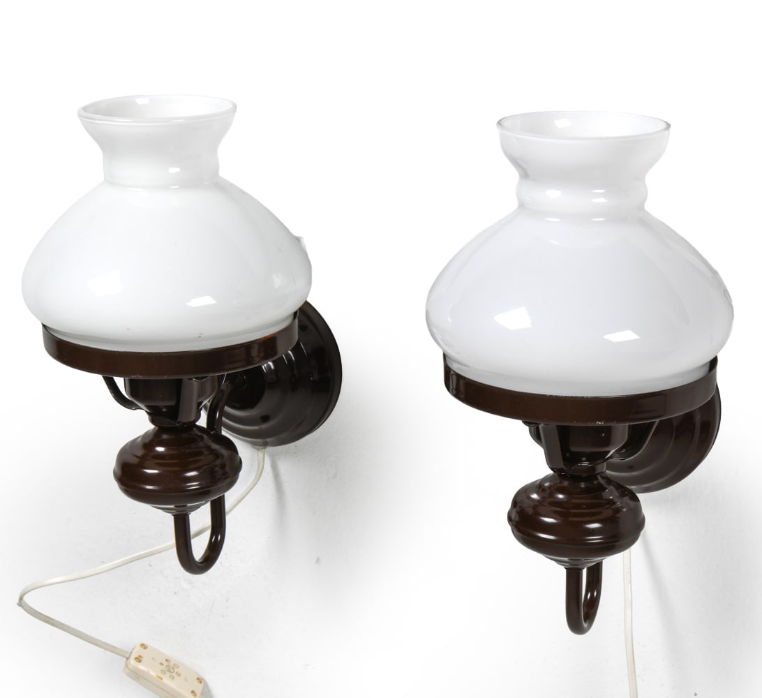 PAIR OF SCANDINAVIAN WALL SCONCES: Steel frames with white glass shades. Circa 1970s. Dimensions: H 10.5" x W 7" x D 8.5". Condition: Wiring untested. Crack to one shade. Wear consistent with age and use. A43